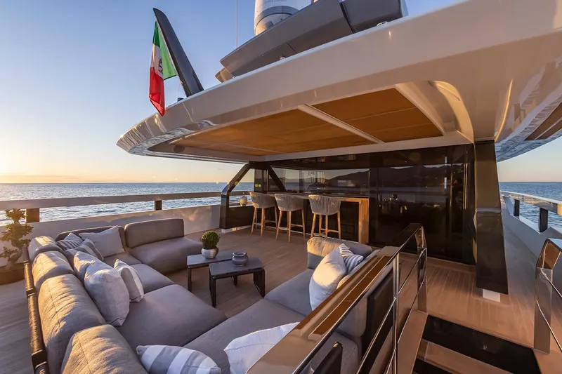 X96 Triplex Yacht Photos Pics Luxurious deck of the 2025 Extra X96 TRIPLEX yacht at sunset.