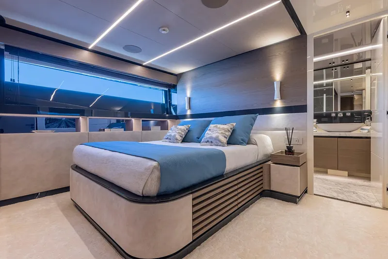 X96 Triplex Yacht Photos Pics Luxurious bedroom interior of the 2025 Extra X96 TRIPLEX yacht with modern design.