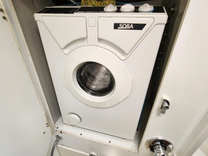 Bella Rose Yacht Photos Pics Compact washing machine installed in a 2006 Hallberg-Rassy 48 yacht.