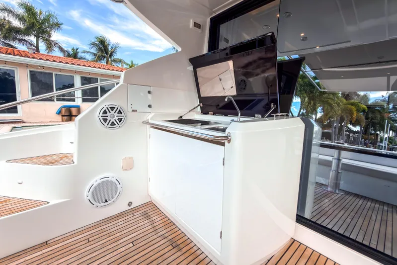  Yacht Photos Pics 2015 Beneteau Gran Turismo 49 yacht deck with outdoor entertainment area.