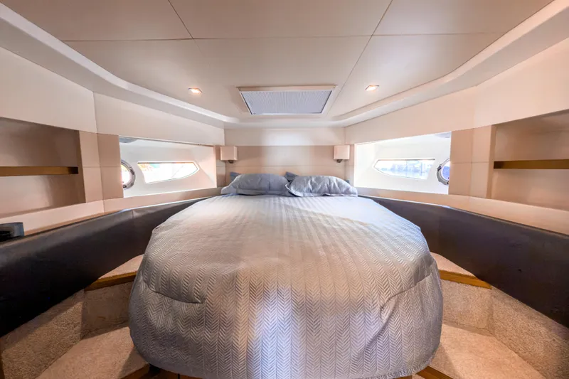  Yacht Photos Pics Luxurious bedroom interior of 2015 Beneteau Gran Turismo 49 yacht with elegant bedding.
