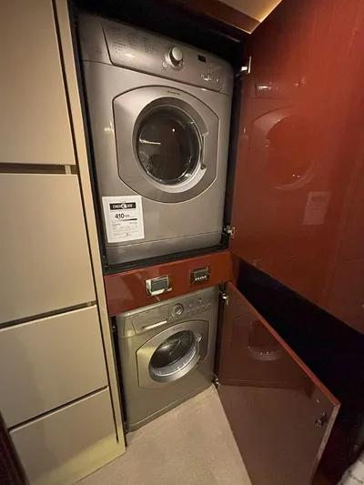  Yacht Photos Pics Stacked washer and dryer in 2017 Sea Ray L590 yacht interior.