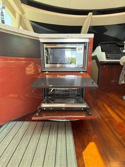  Yacht Photos Pics 2017 Sea Ray L590 yacht interior with modern kitchen appliances and wooden flooring.