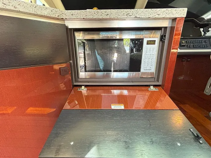  Yacht Photos Pics 2017 Sea Ray L590 yacht kitchen with built-in stainless steel microwave.