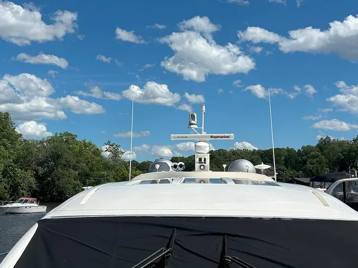  Yacht Photos Pics 2017 Sea Ray L590 yacht under a clear blue sky with scattered clouds.