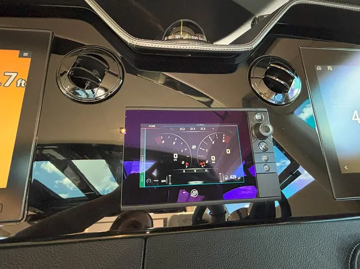  Yacht Photos Pics Dashboard of a 2017 Sea Ray L590 yacht with digital displays and controls.