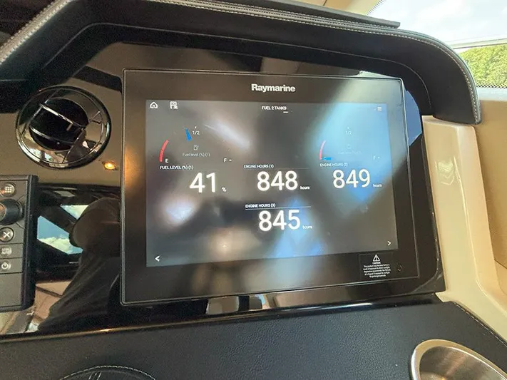  Yacht Photos Pics Raymarine display on 2017 Sea Ray L590 showing engine hours and fuel levels.