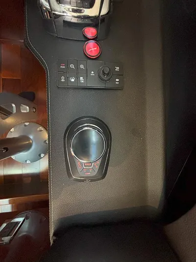  Yacht Photos Pics Control panel of a 2017 Sea Ray L590 yacht with joystick and buttons.