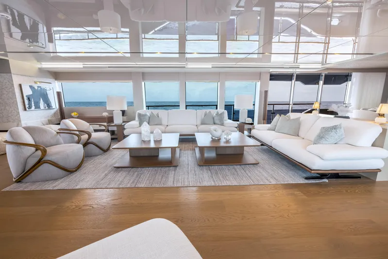 Evelyn P Yacht Photos Pics Luxurious interior of 2022 Numarine 37XP yacht with elegant seating and ocean view.