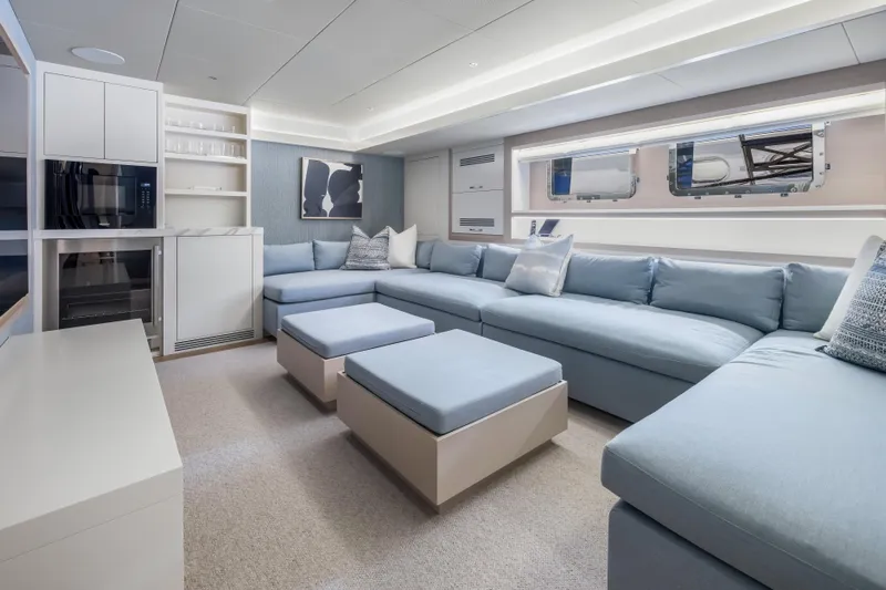 Evelyn P Yacht Photos Pics Luxurious interior of 2022 Numarine 37XP yacht with modern seating and elegant decor.