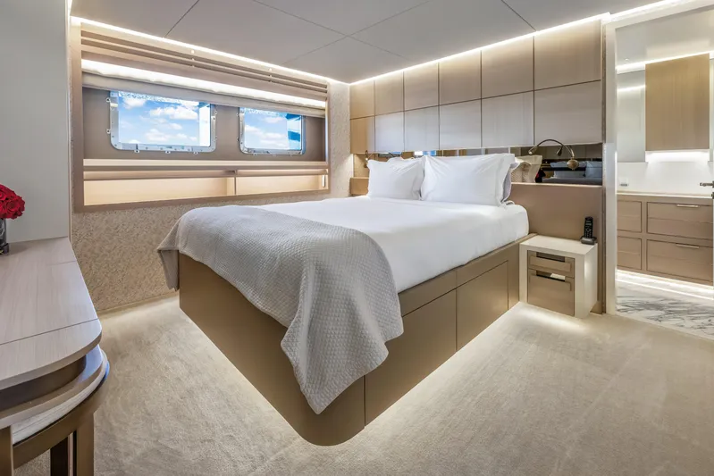 Evelyn P Yacht Photos Pics Luxurious bedroom interior of 2022 Numarine 37XP yacht with modern design and elegant furnishings.