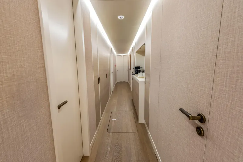 Evelyn P Yacht Photos Pics Luxurious hallway interior of 2022 Numarine 37XP yacht with modern design and ambient lighting.