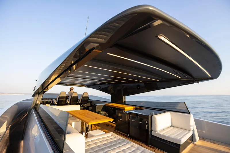  Yacht Photos Pics Luxurious 2025 MandaYachts 07 SPIDER with sleek design and spacious seating on open water.