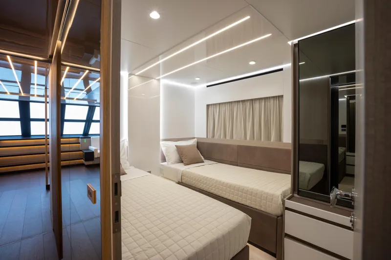 Yacht Photos Pics Luxurious interior of 2025 MandaYachts 07 SPIDER, featuring modern twin beds and sleek design.