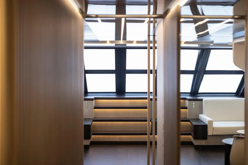  Yacht Photos Pics Luxurious interior of 2025 MandaYachts 07 SPIDER with modern seating and large windows.