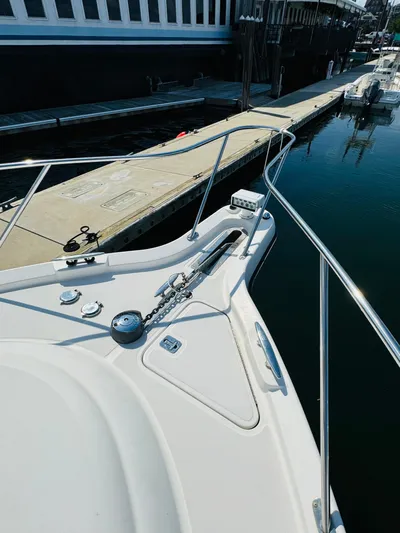 Why Knot Yacht Photos Pics 2007 Tiara Yachts 3900 Sovran docked at a marina.