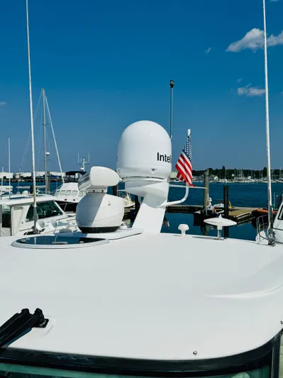 Why Knot Yacht Photos Pics 2007 Tiara Yachts 3900 Sovran docked at a marina with radar equipment.