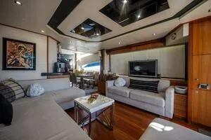  Yacht Photos Pics Luxurious interior of a 2015 Sunseeker 75 yacht with modern furnishings and elegant decor.