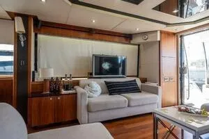  Yacht Photos Pics Luxurious interior of 2015 Sunseeker 75 yacht with modern furnishings and entertainment system.