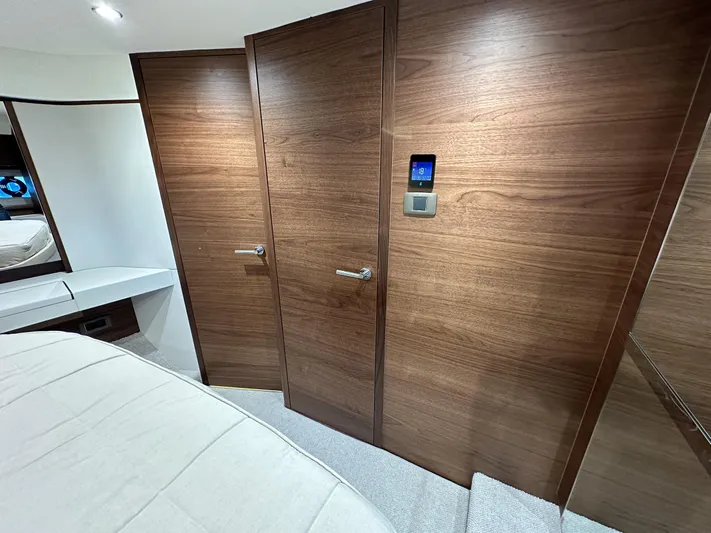 F45110 Yacht Photos Pics Interior of 2024 Princess F45 yacht with wooden doors and modern design.