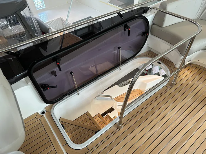 F45110 Yacht Photos Pics 2024 Princess F45 yacht interior with wooden flooring and sleek railing design.
