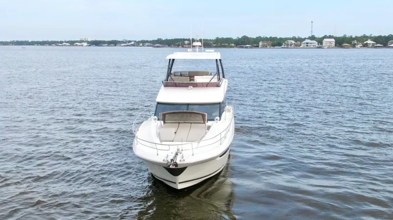  Yacht Photos Pics 2019 Prestige 520 yacht on calm water, front view.