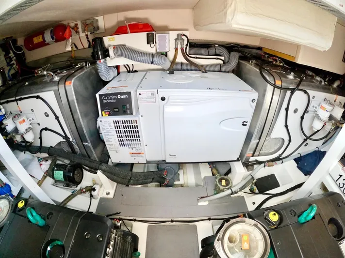  Yacht Photos Pics Engine room of a 2019 Prestige 520 yacht with generator and equipment.