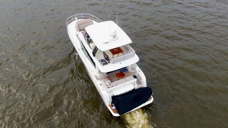  Yacht Photos Pics Luxury 2019 Prestige 520 yacht cruising on open water.