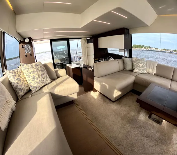  Yacht Photos Pics Luxurious interior of a 2019 Prestige 520 yacht with elegant seating and panoramic windows.