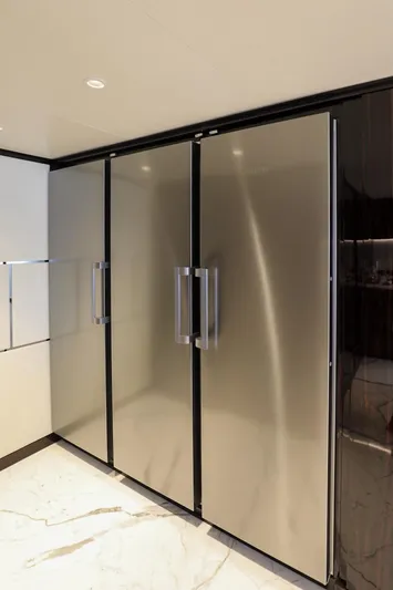  Yacht Photos Pics Sleek 2025 Majesty 120 yacht interior with modern stainless steel appliances.