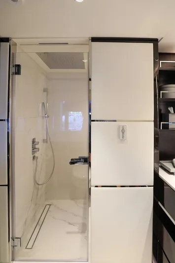  Yacht Photos Pics Luxurious bathroom in 2025 Majesty 120 yacht with modern shower design.
