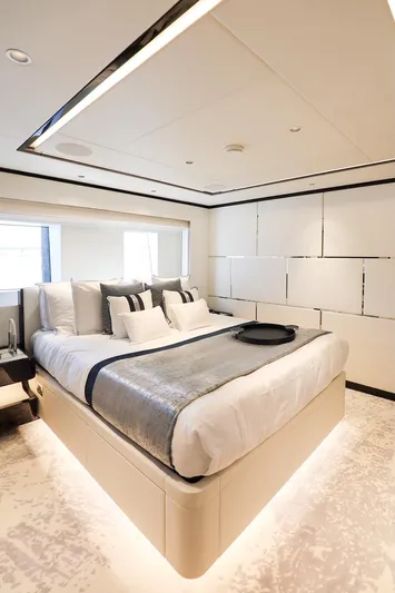  Yacht Photos Pics Luxurious bedroom interior in 2025 Majesty 120 yacht, featuring modern design and elegant decor.