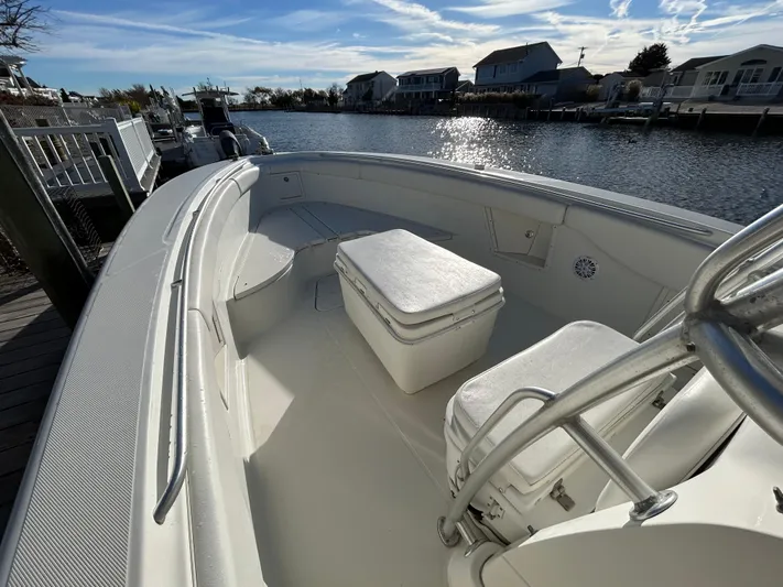  Yacht Photos Pics 2004 Hydra-Sports Vector 3300 CC boat docked by waterfront homes.