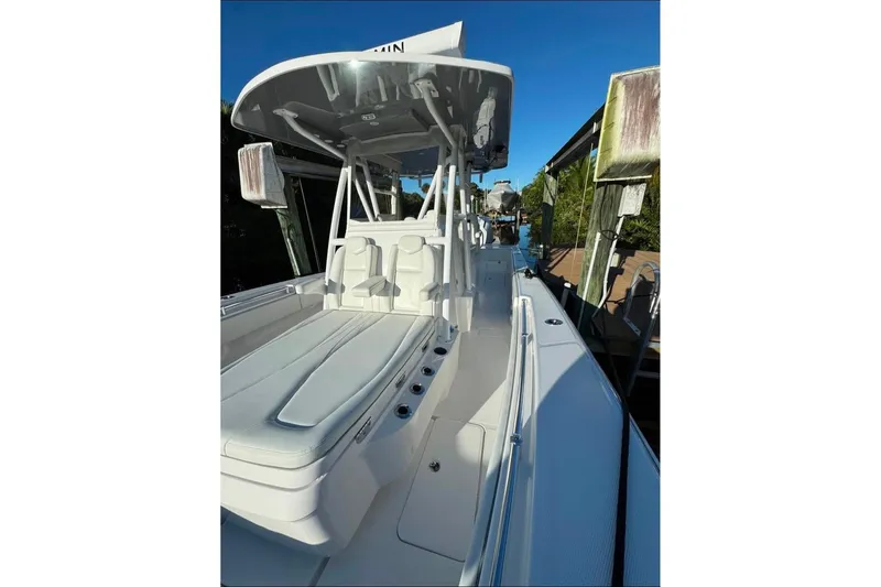  Yacht Photos Pics 2024 Invincible 33 Open Fisherman boat with sleek design and spacious seating.