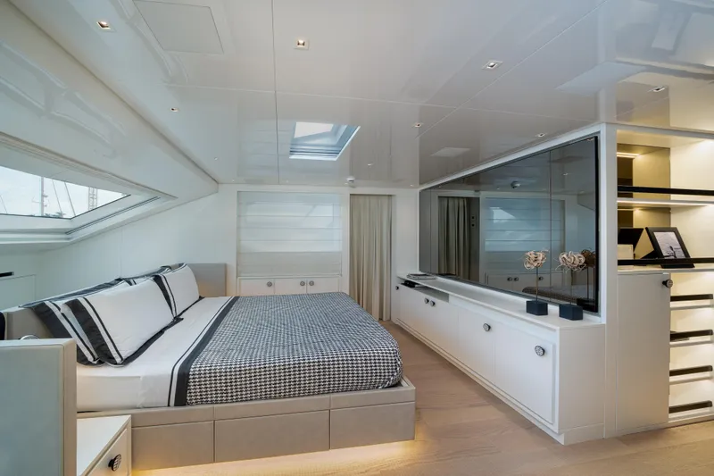 Clic - Sl96a/764 Yacht Photos Pics Luxurious bedroom interior of 2022 Sanlorenzo SL96A yacht, featuring modern design and elegant furnishings.