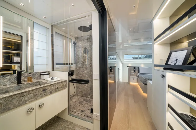 Clic - Sl96a/764 Yacht Photos Pics Luxurious interior of 2022 Sanlorenzo SL96A yacht featuring modern bathroom and hallway design.