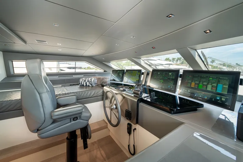 Clic - Sl96a/764 Yacht Photos Pics Luxurious 2022 Sanlorenzo SL96A yacht helm with modern navigation technology and sleek design.