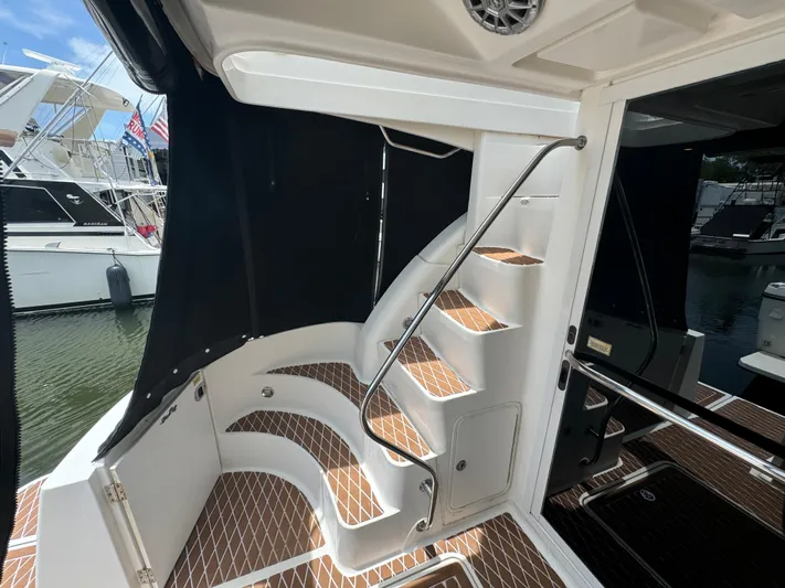  Yacht Photos Pics 2007 Sea Ray 36 Sedan Bridge yacht interior with staircase and teak flooring.