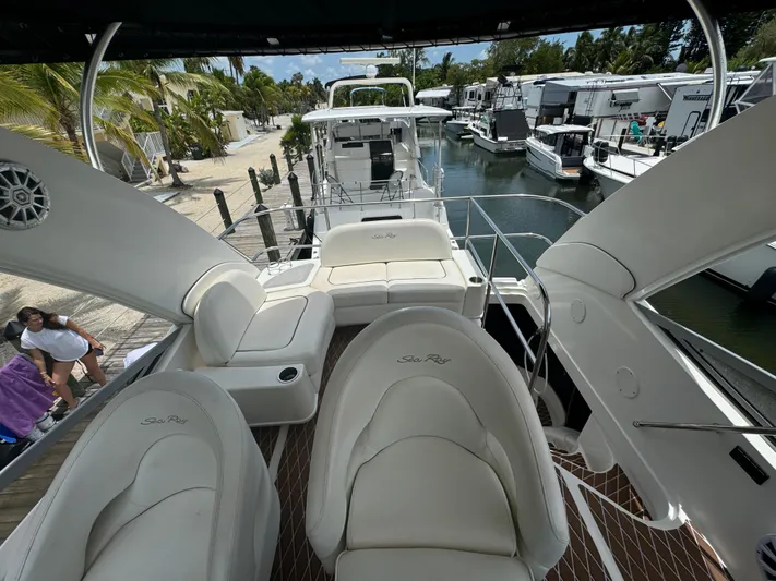  Yacht Photos Pics 2007 Sea Ray 36 Sedan Bridge yacht with spacious seating, docked in a marina.