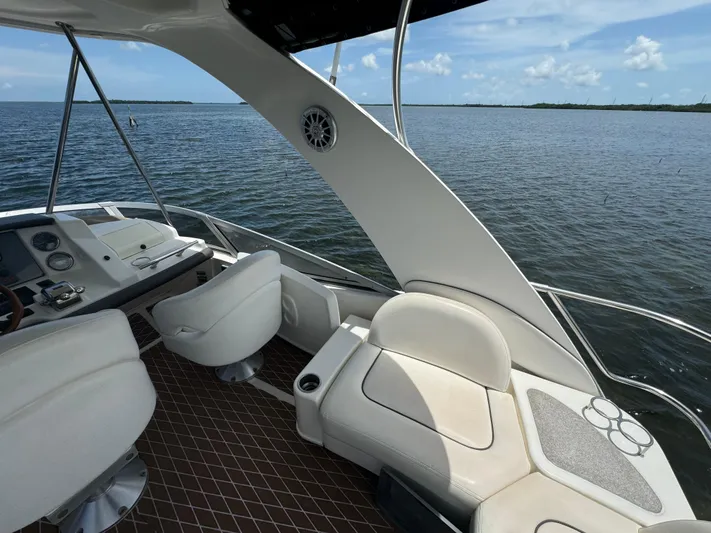  Yacht Photos Pics 2007 Sea Ray 36 Sedan Bridge yacht interior with seating and ocean view.