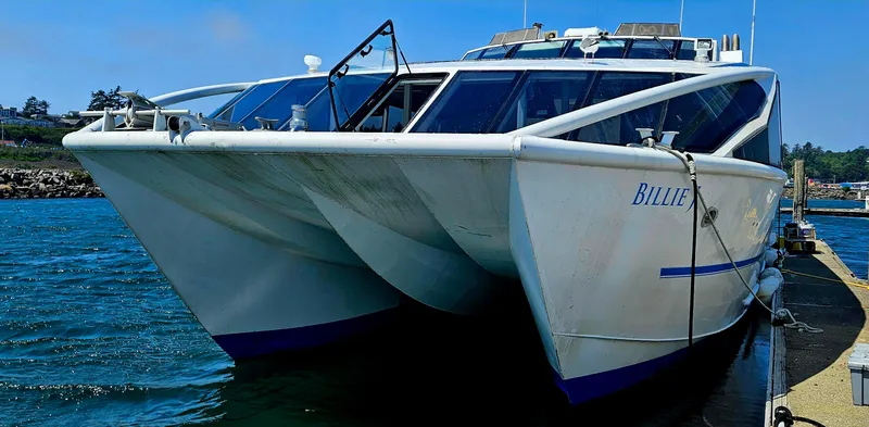 Billie J Yacht Photos Pics High-speed passenger catamaran docked, Custom model, 2008, designed for 70 passengers.