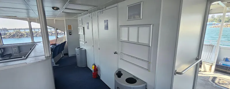 Billie J Yacht Photos Pics Interior of a 2008 Custom High Speed 70pax COI Passenger vessel, featuring modern amenities.