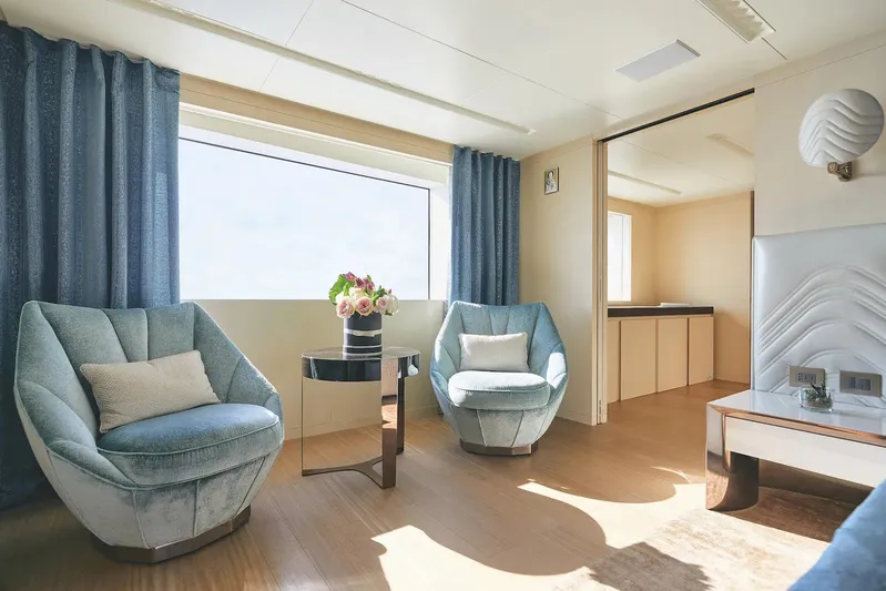  Yacht Photos Pics Luxurious Benetti B.NOW 2022 yacht interior with elegant seating and large window view.