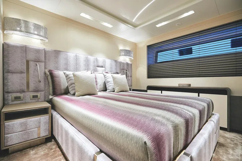  Yacht Photos Pics Luxurious bedroom interior on 2022 Benetti B.NOW yacht, featuring elegant design and modern furnishings.