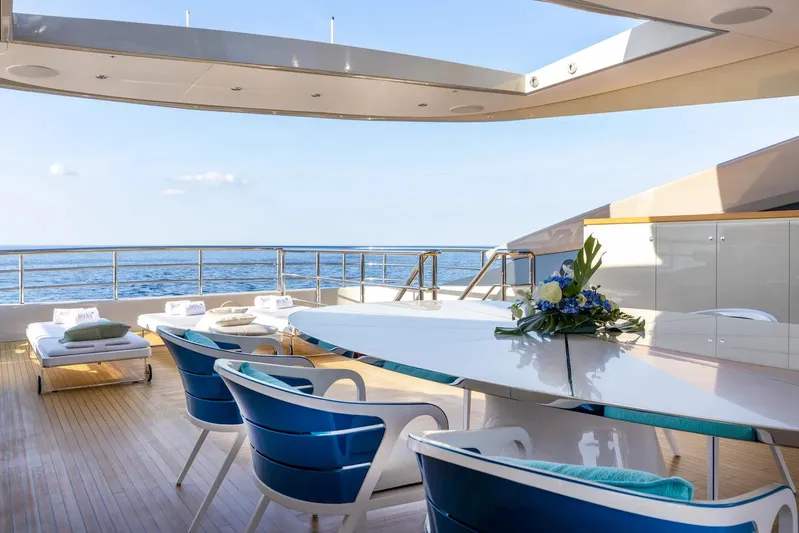  Yacht Photos Pics Luxurious Benetti B.NOW 2022 yacht deck with ocean view, elegant seating, and modern design.