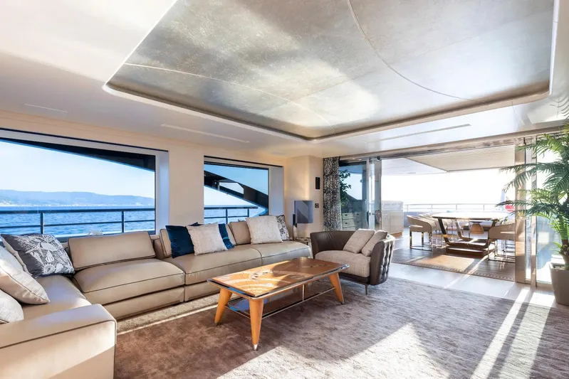  Yacht Photos Pics Luxurious Benetti B.NOW 2022 yacht interior with ocean view, elegant seating, and modern decor.