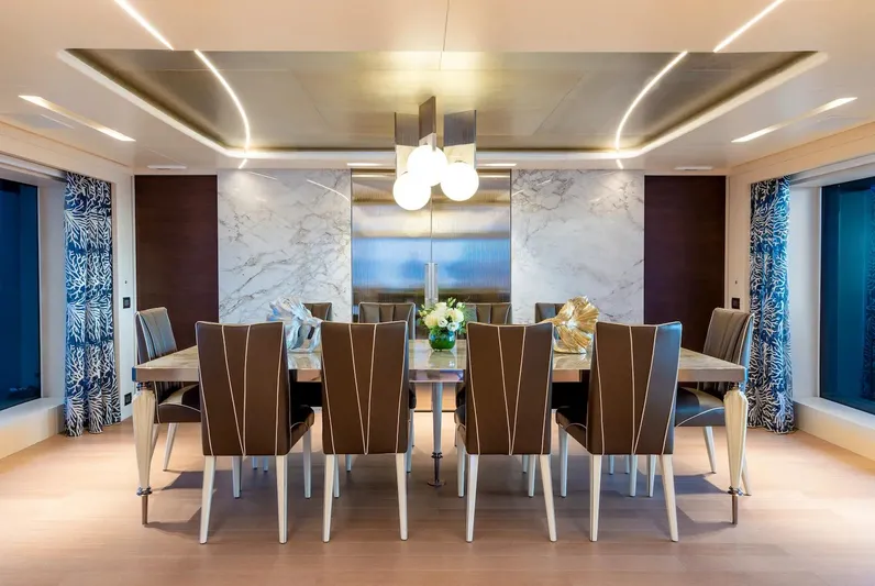  Yacht Photos Pics Luxurious dining area on 2022 Benetti B.NOW yacht with elegant decor and modern lighting.