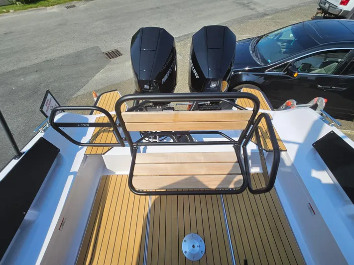  Yacht Photos Pics 2023 XO Boats EXPLR 10 Sport Plus with twin Mercury outboard engines, rear deck view.