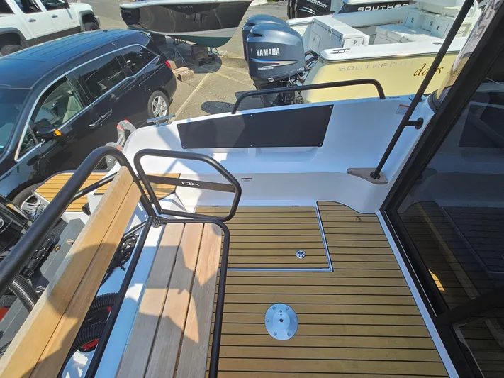  Yacht Photos Pics 2023 XO Boats EXPLR 10 Sport Plus deck with seating and Yamaha outboard motor.