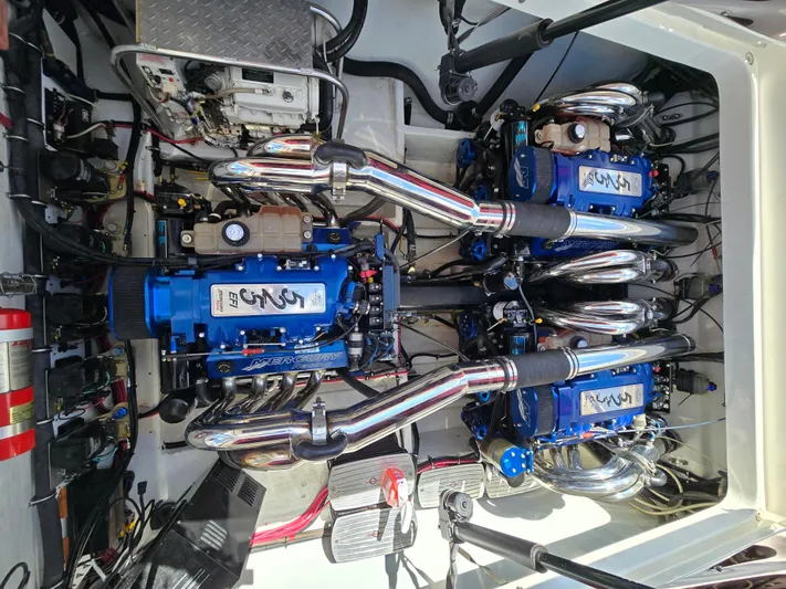  Yacht Photos Pics Engine compartment of a 2004 Fountain 47 Lightning boat with dual Mercury engines.